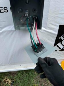 We repaired a faulty doorbell and installed a 50 amp RV outlet next to a crawl space door in Glen Burnie, MD, improving both the functionality and convenience of the home.