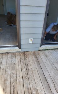 Deshaies Electrical Services installing an electrical outlet for comprehensive installation and repair services