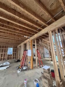 Deshaies Electrical Services installing electrical wiring in a construction site