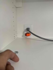 Deshaies Electrical Services performing an electrical load side inspection and securing connections for safety