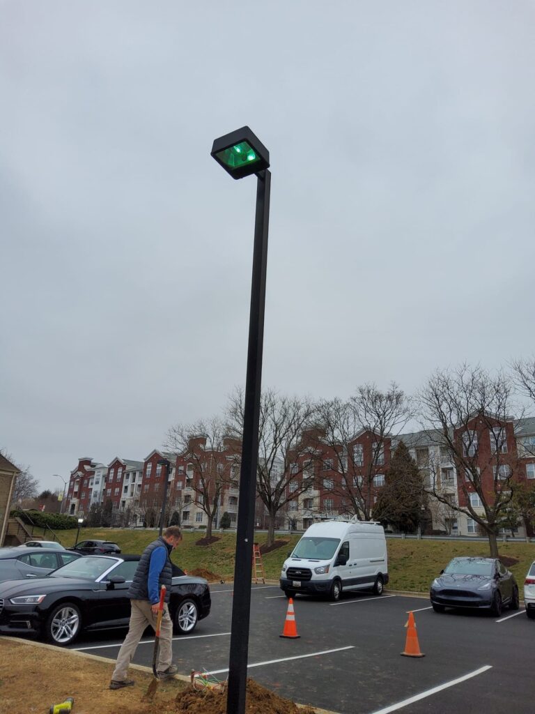 Deshaies Electrical Services repairing and upgrading parking lot lighting for improved visibility and safety