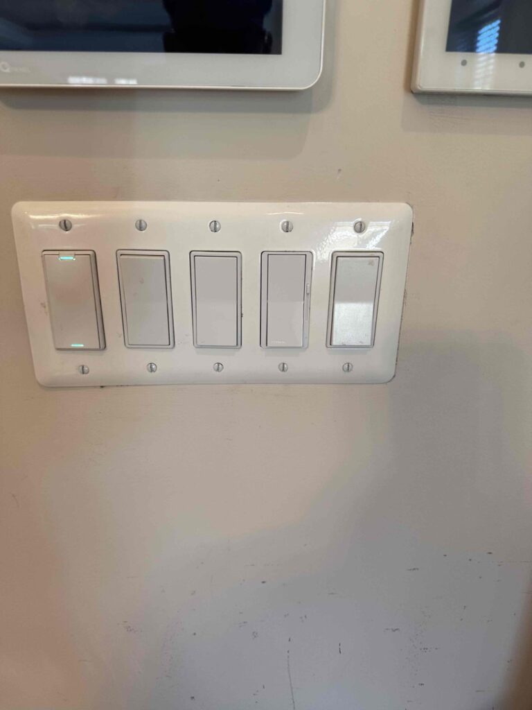 Deshaies Electrical Services installing dimmer switches for master bedroom lighting