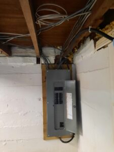 Deshaies Electrical Services installing a new electrical panel for front porch lighting upgrade