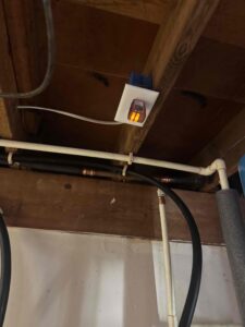 Deshaies Electrical Services installing an outlet for the fridge and water heater connection