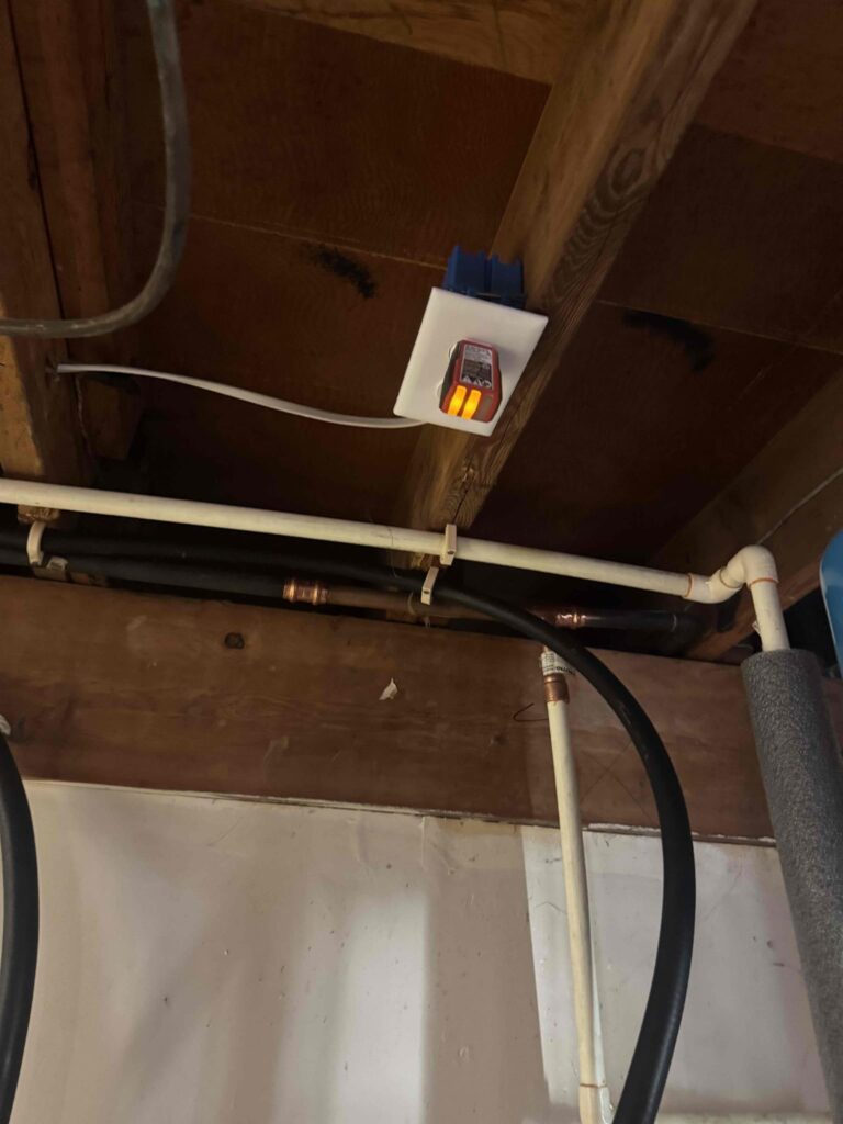Deshaies Electrical Services installing an outlet for the fridge and water heater connection