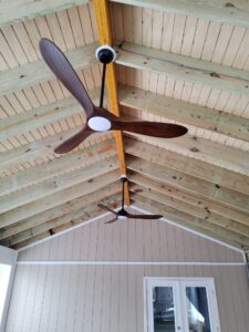 Deshaies Electrical Services installing ceiling fans as part of the porch lighting and switches upgrade project
