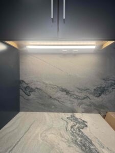 Deshaies Electrical Services installing under-cabinet lighting as part of a comprehensive electrical installation project