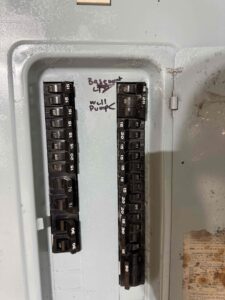 Deshaies Electrical Services labeling circuit breakers for temporary power and lighting installation