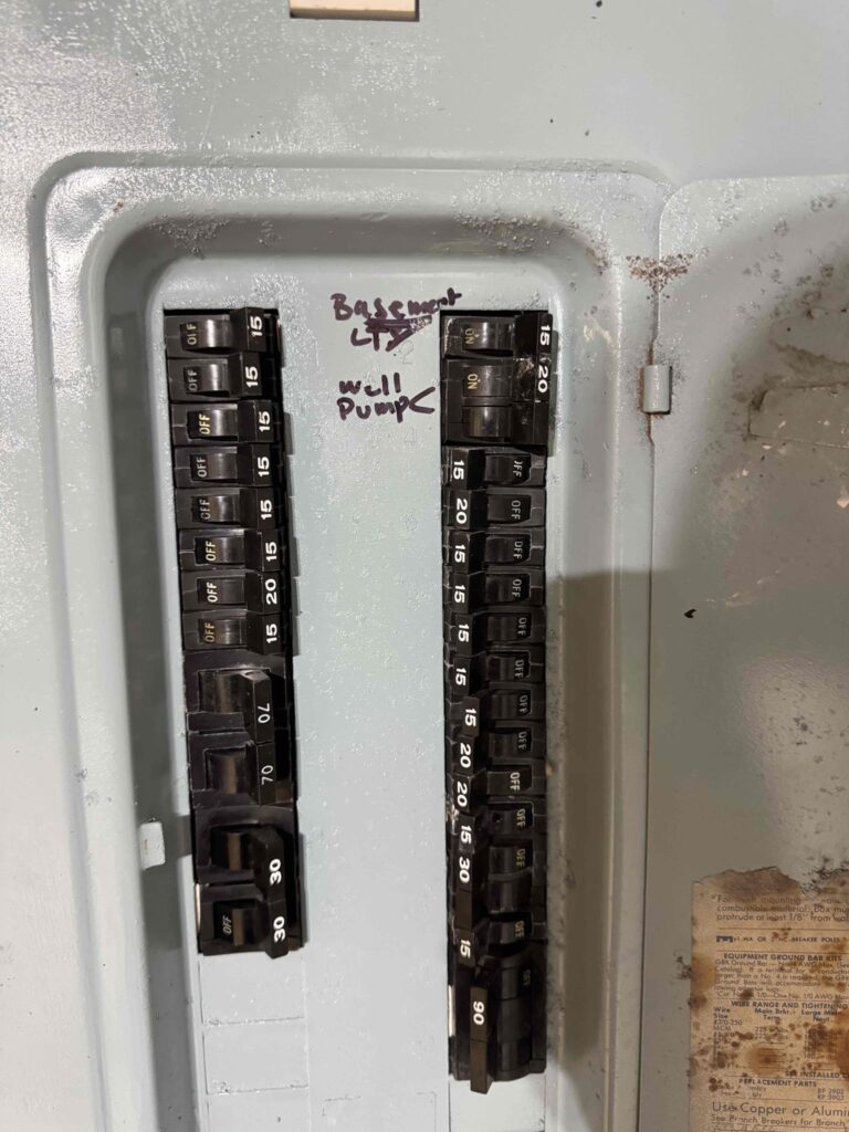 Deshaies Electrical Services labeling circuit breakers for temporary power and lighting installation