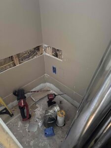 Deshaies Electrical Services performing electrical installation preparatory work for a comprehensive bathroom overhaul