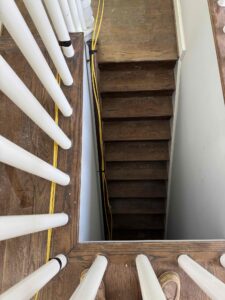 Temporary electrical wiring installation for power and lighting in a residential setting